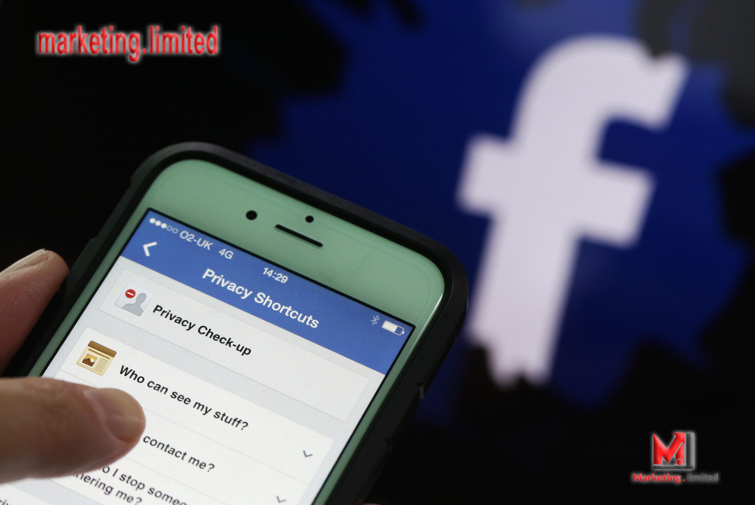 Privacy setting shortcuts are displayed on Apple Inc. iPhone 6 smartphone screen as a FaceBook Inc. logo is seen in this arranged photograph taken in London, U.K., on Friday, May, 15, 2015. Facebook reached a deal with New York Times Co. and eight other media outlets to post stories directly to the social network's mobile news feeds, as publishers strive for new ways to expand their reach. Photographer: Chris Ratcliffe/Bloomberg via Getty Images